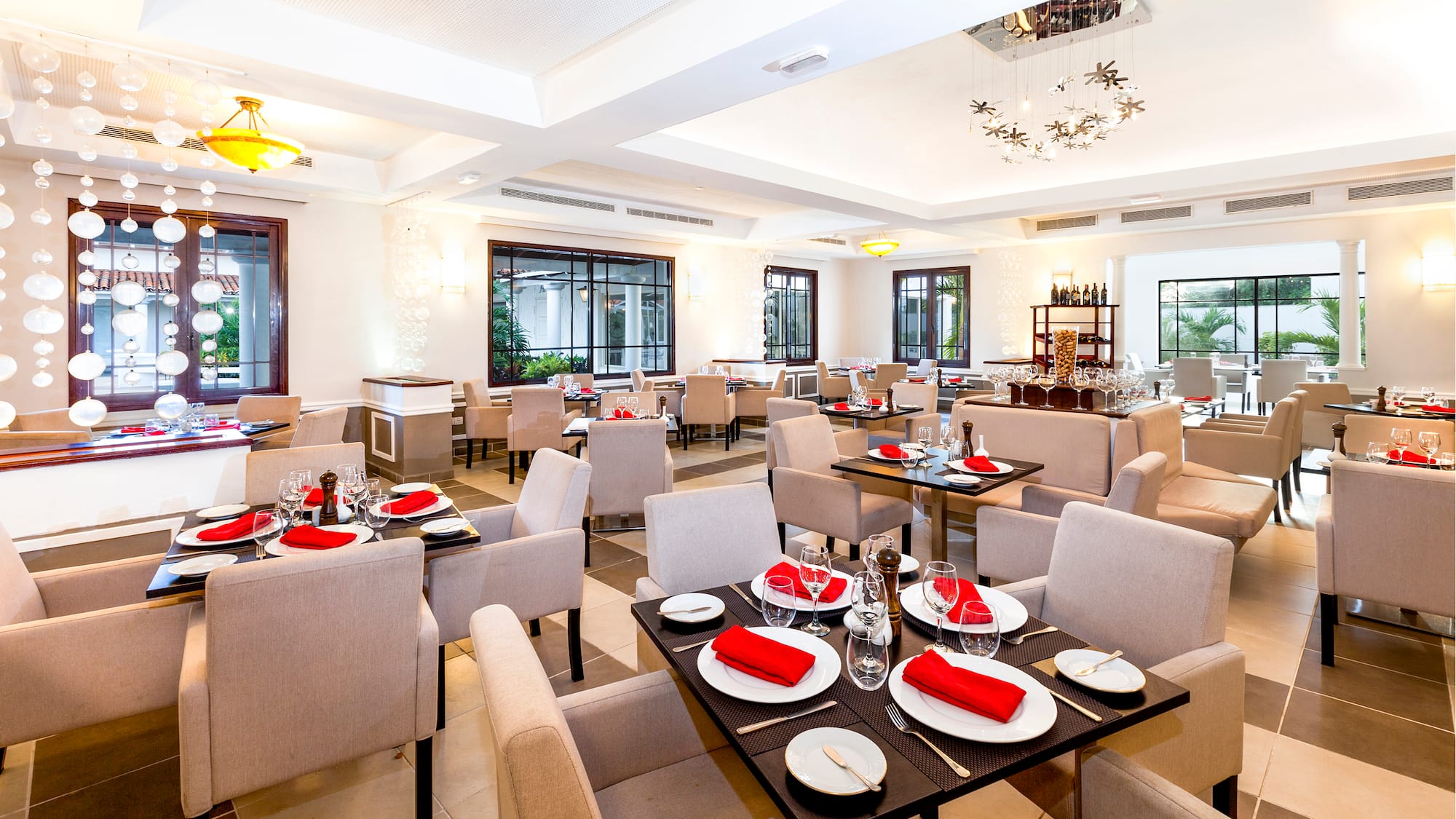 a restaurant with tables and chairs