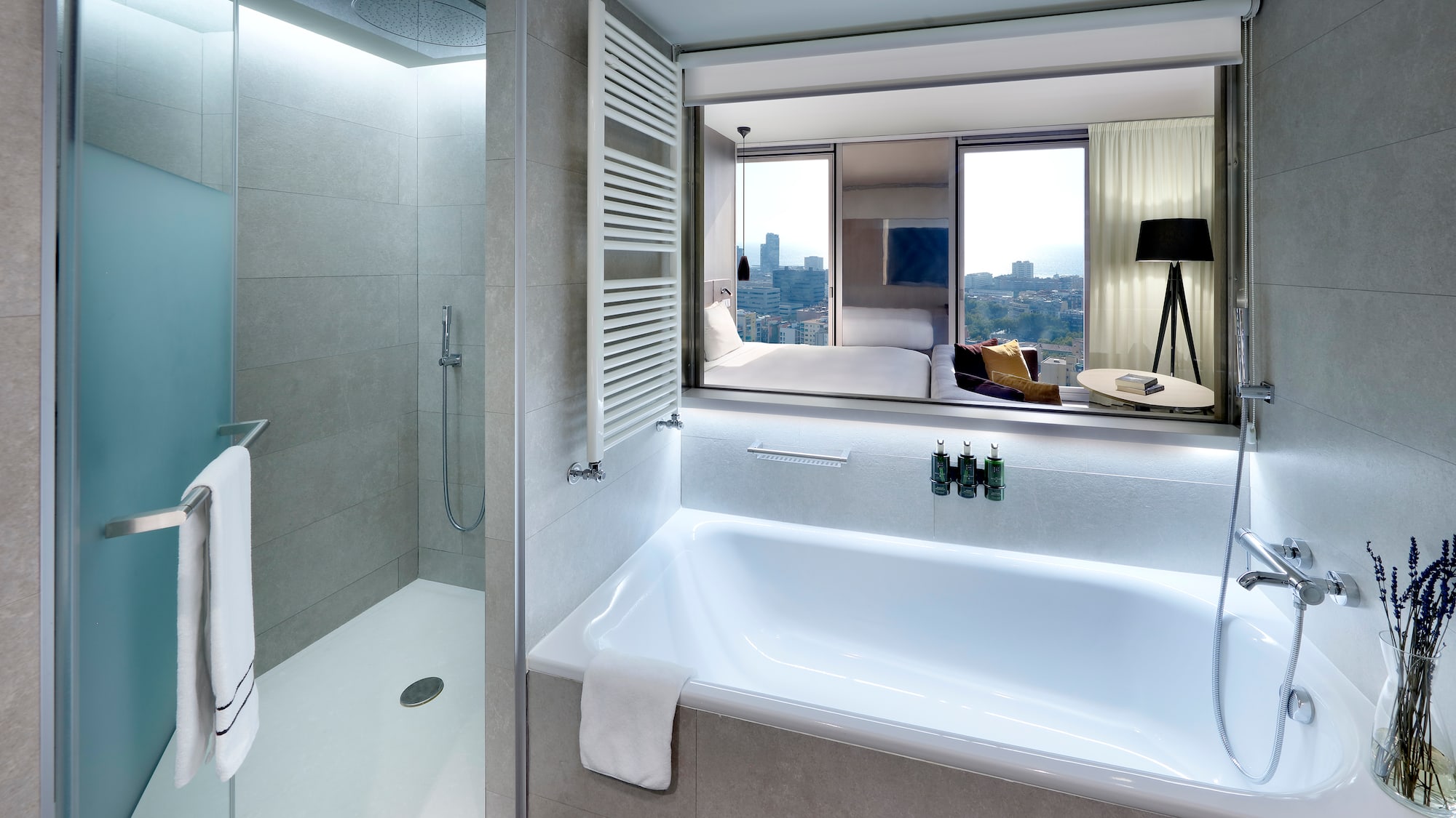 a bathroom with a bathtub and a shower