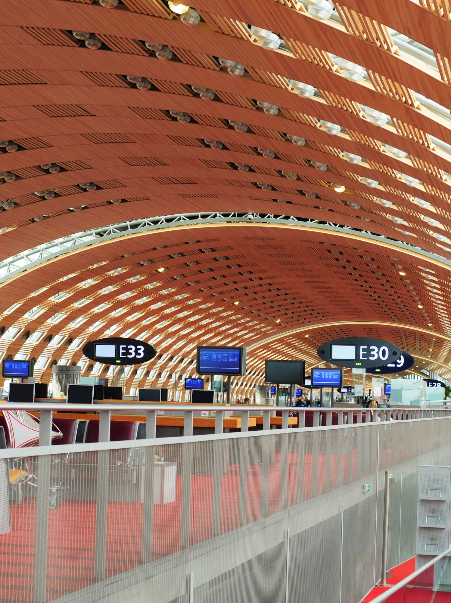 a woman walking in a tunnel