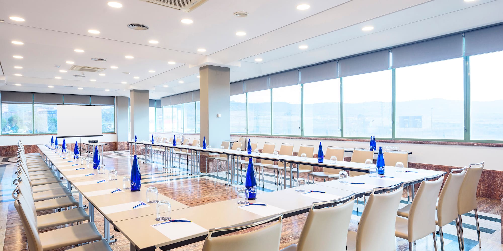 a room with tables and chairs