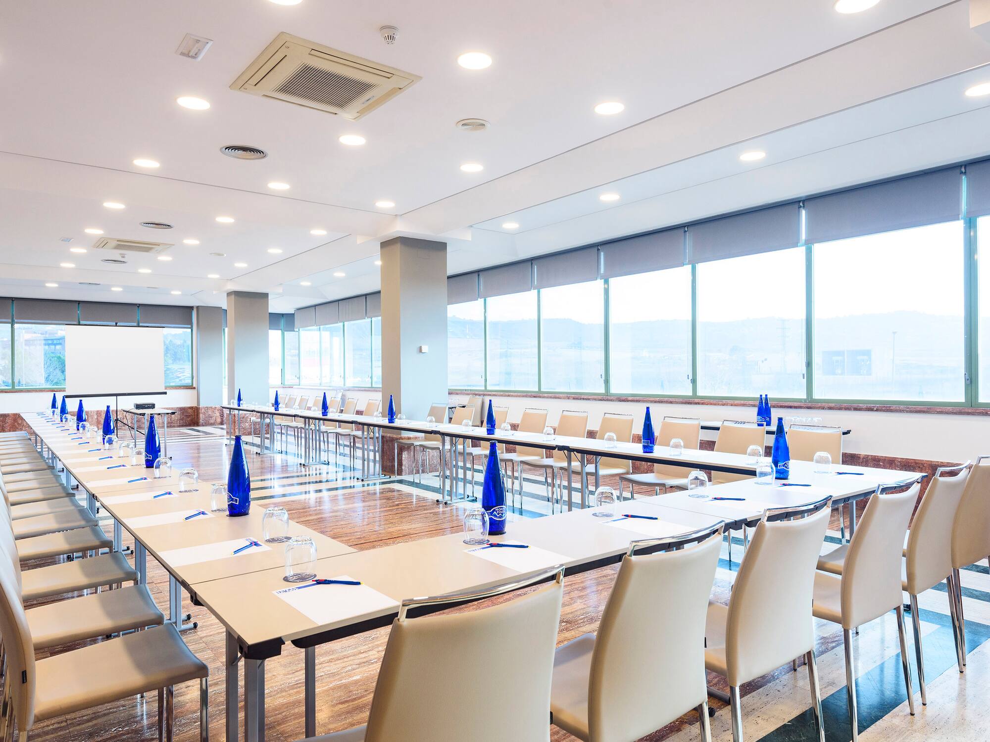 a room with tables and chairs