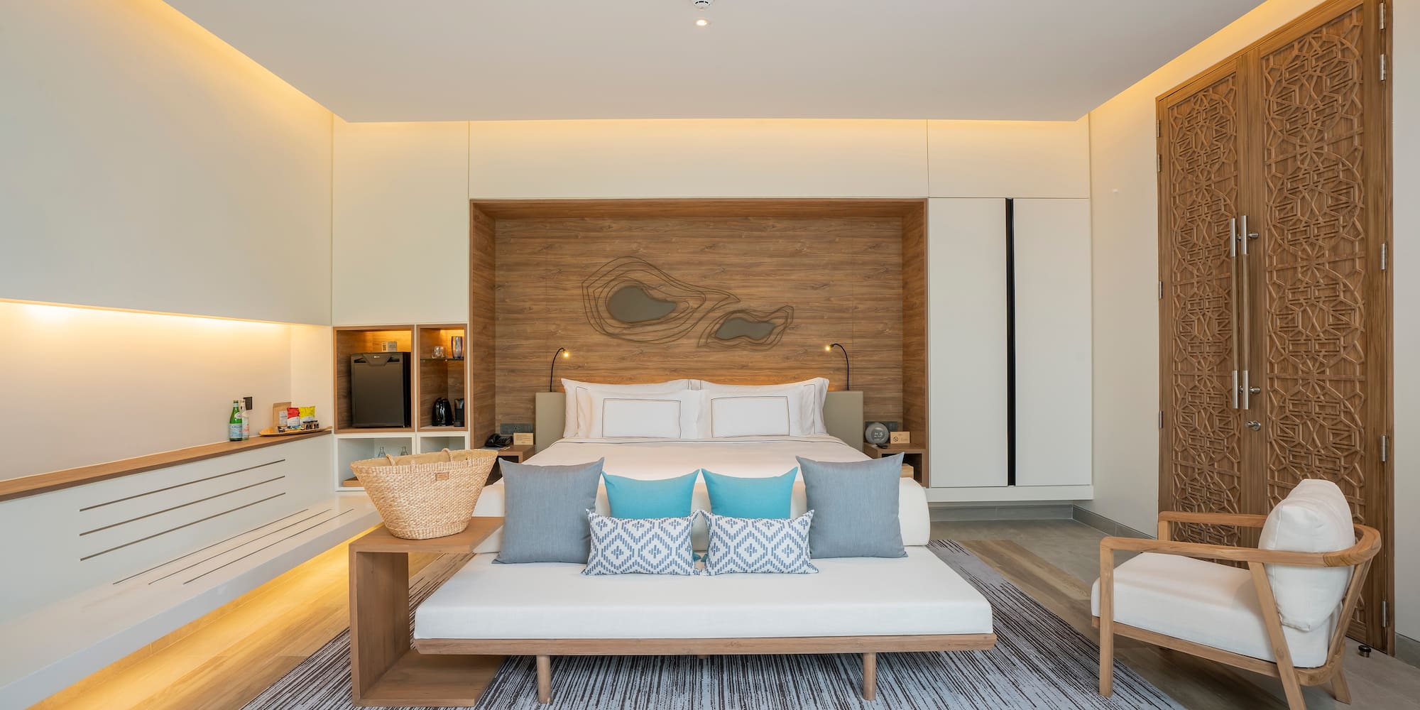 a room with a bed and a fan