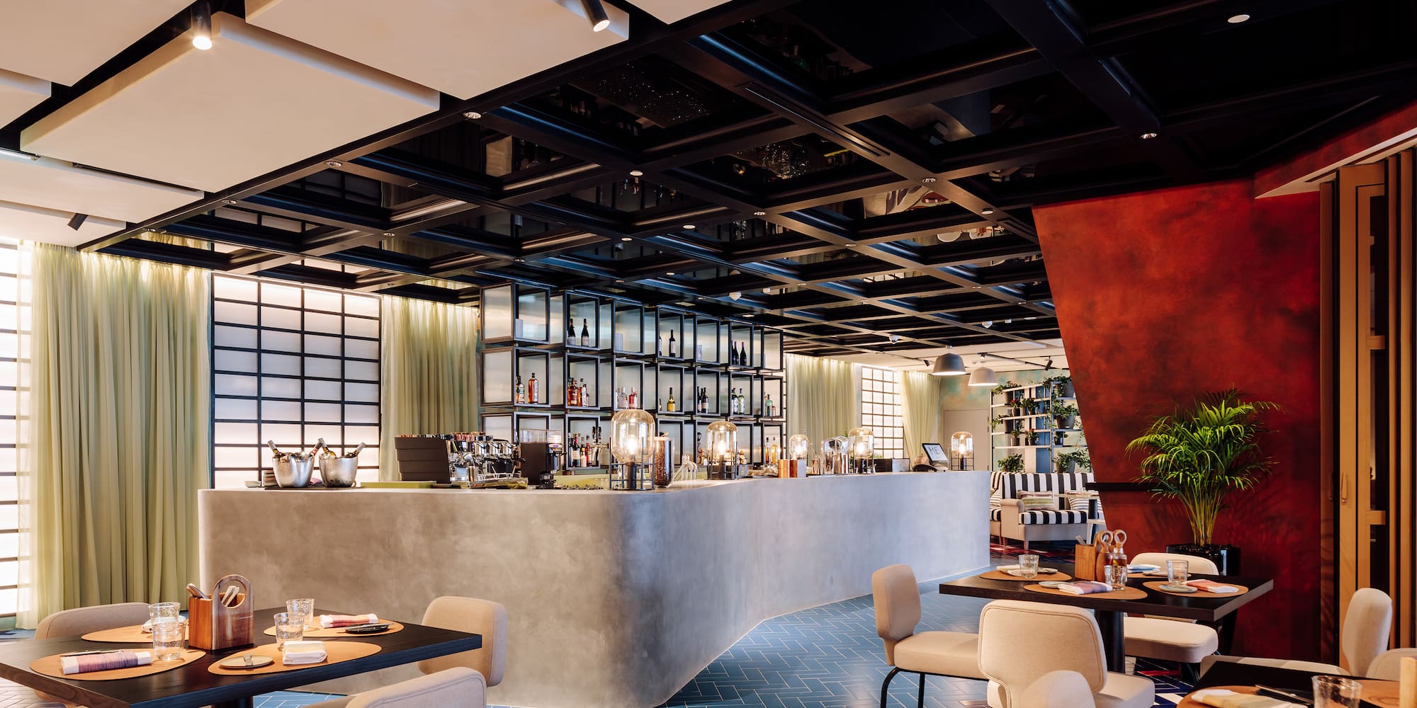 a restaurant with tables and chairs