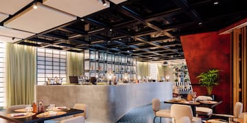 a restaurant with tables and chairs