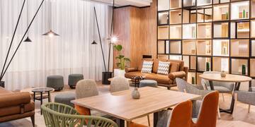 a room with a table and chairs