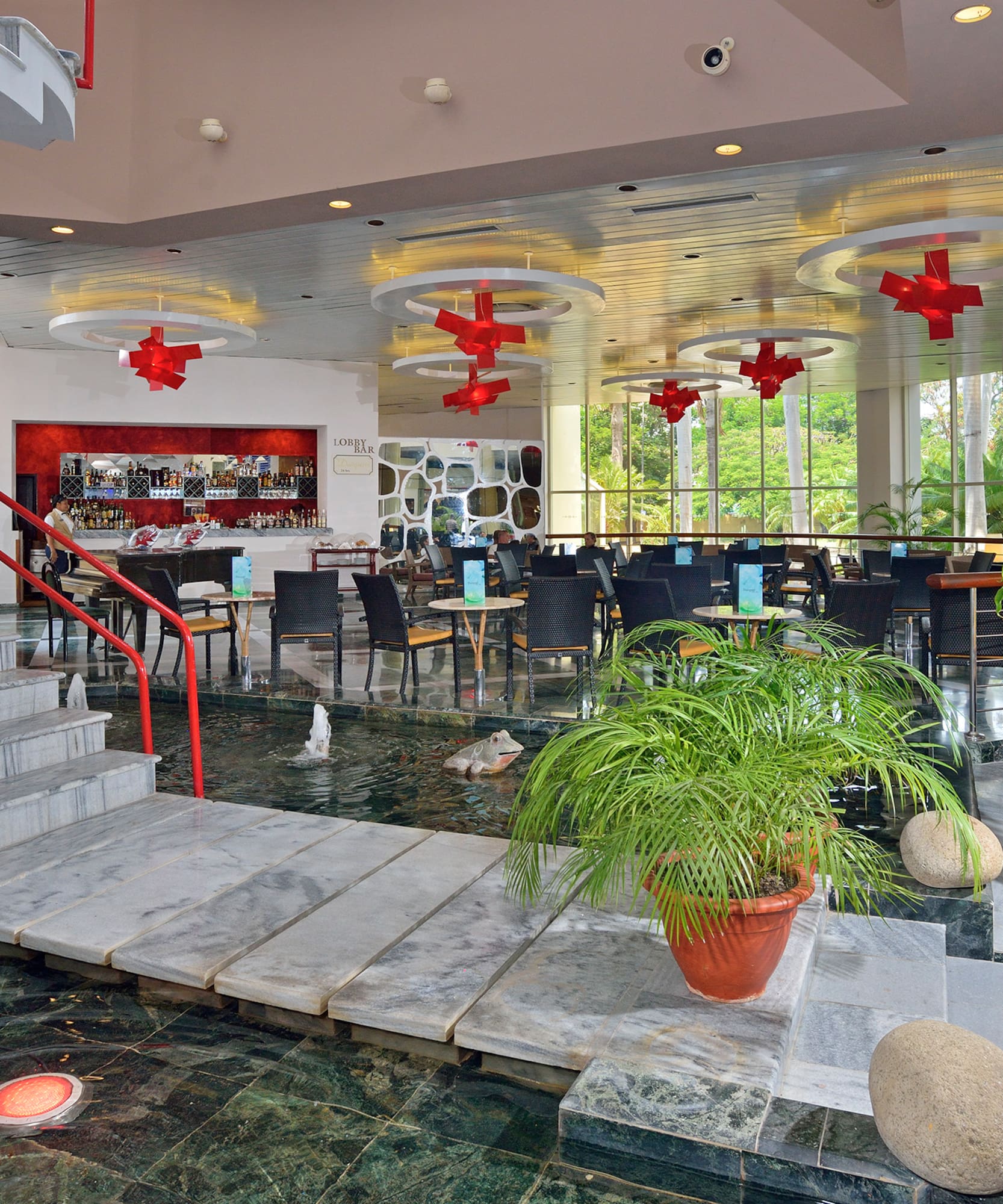a flooded restaurant with a staircase and a staircase