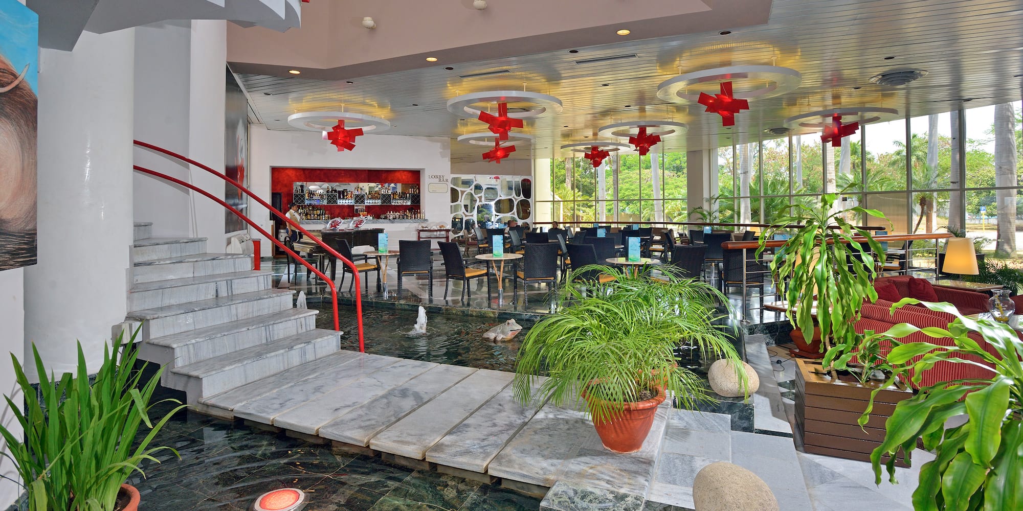 a flooded restaurant with a staircase and a staircase