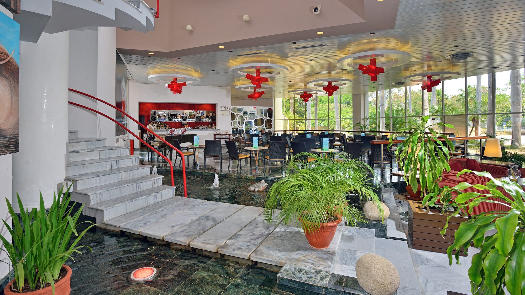 a flooded restaurant with a staircase and a staircase