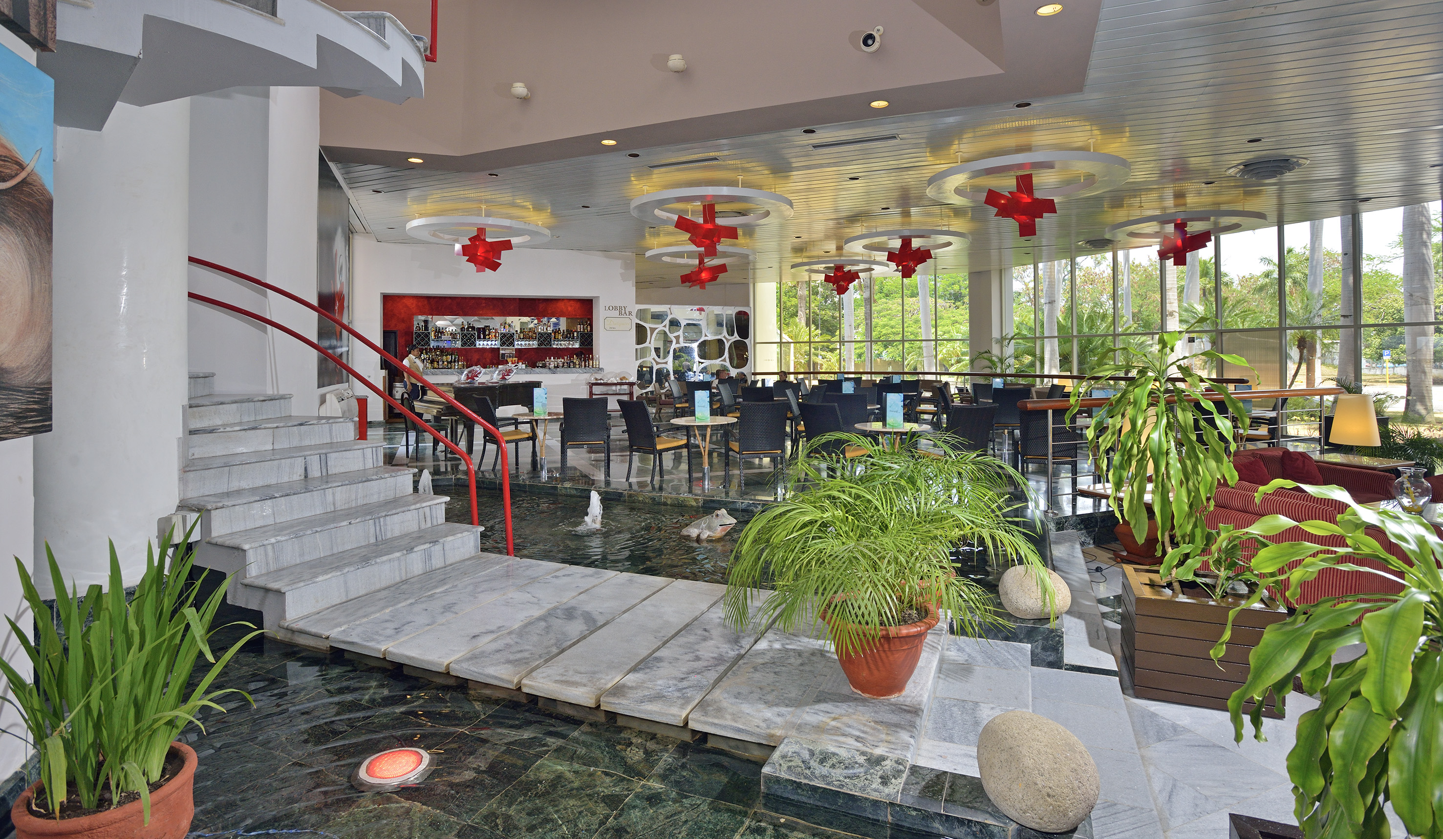 a flooded restaurant with a staircase and a staircase