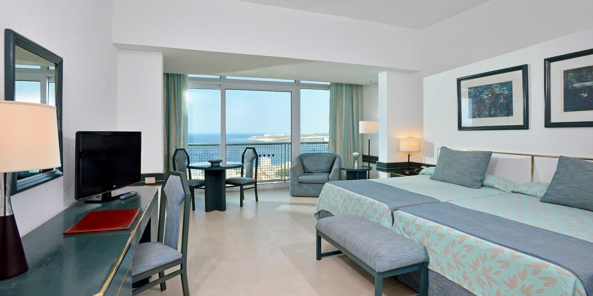 a room with a television and a bed