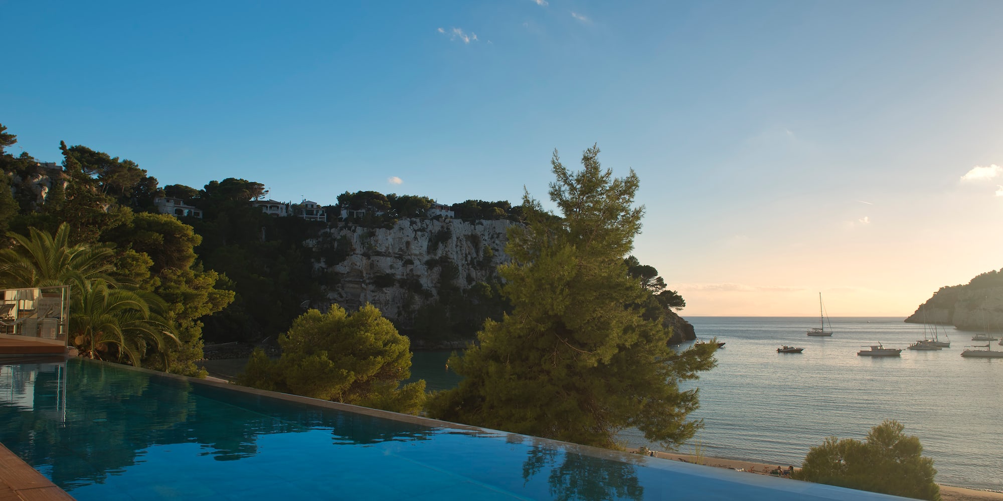 a pool overlooking a body of water