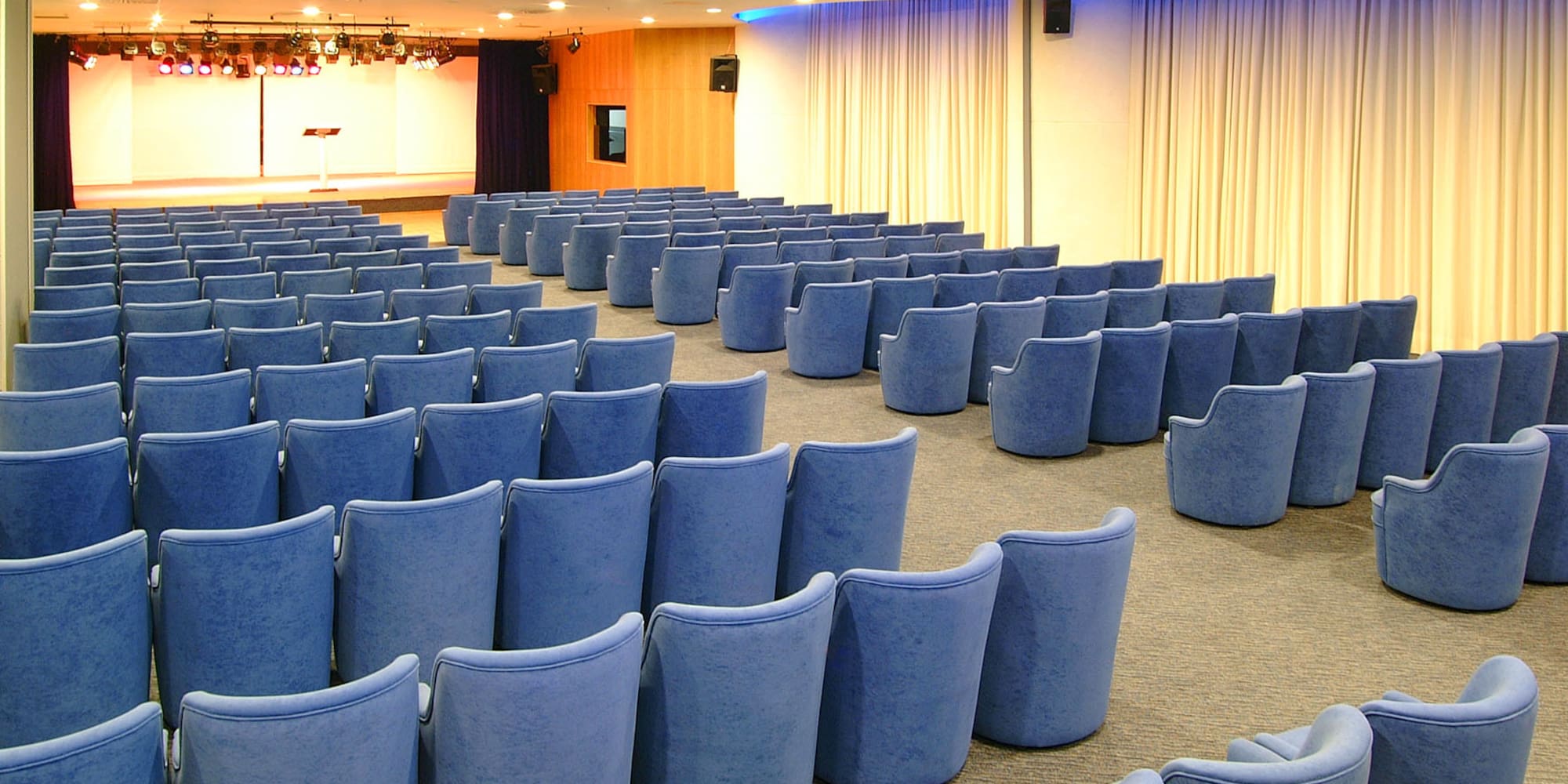 a room with blue chairs