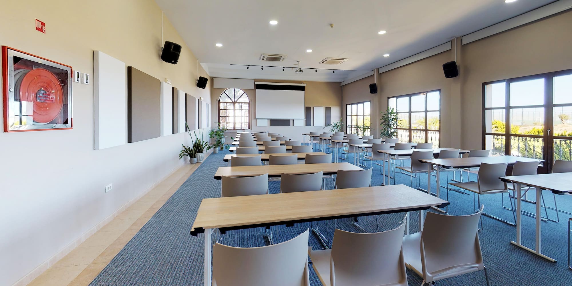 a room with tables and chairs