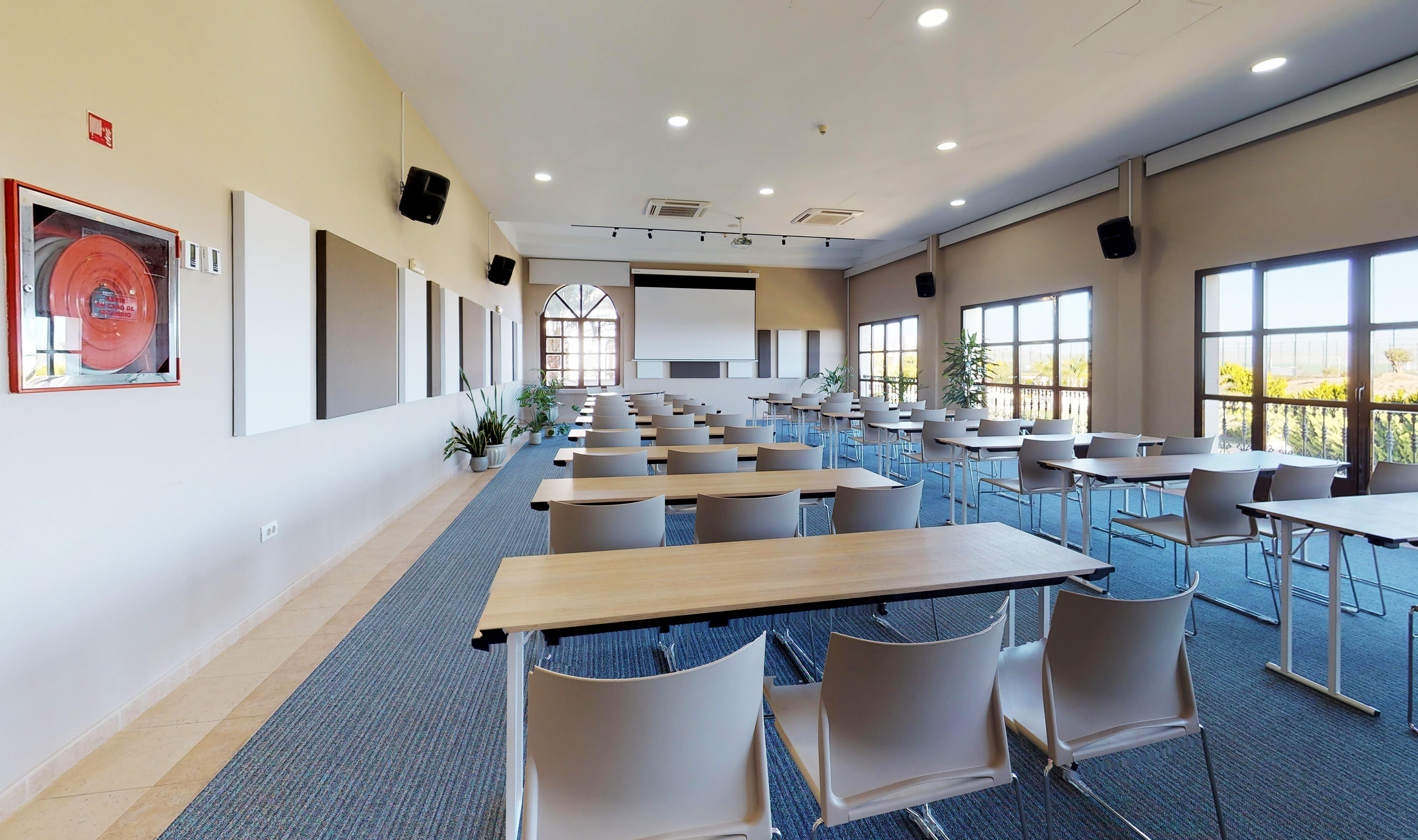 a room with tables and chairs