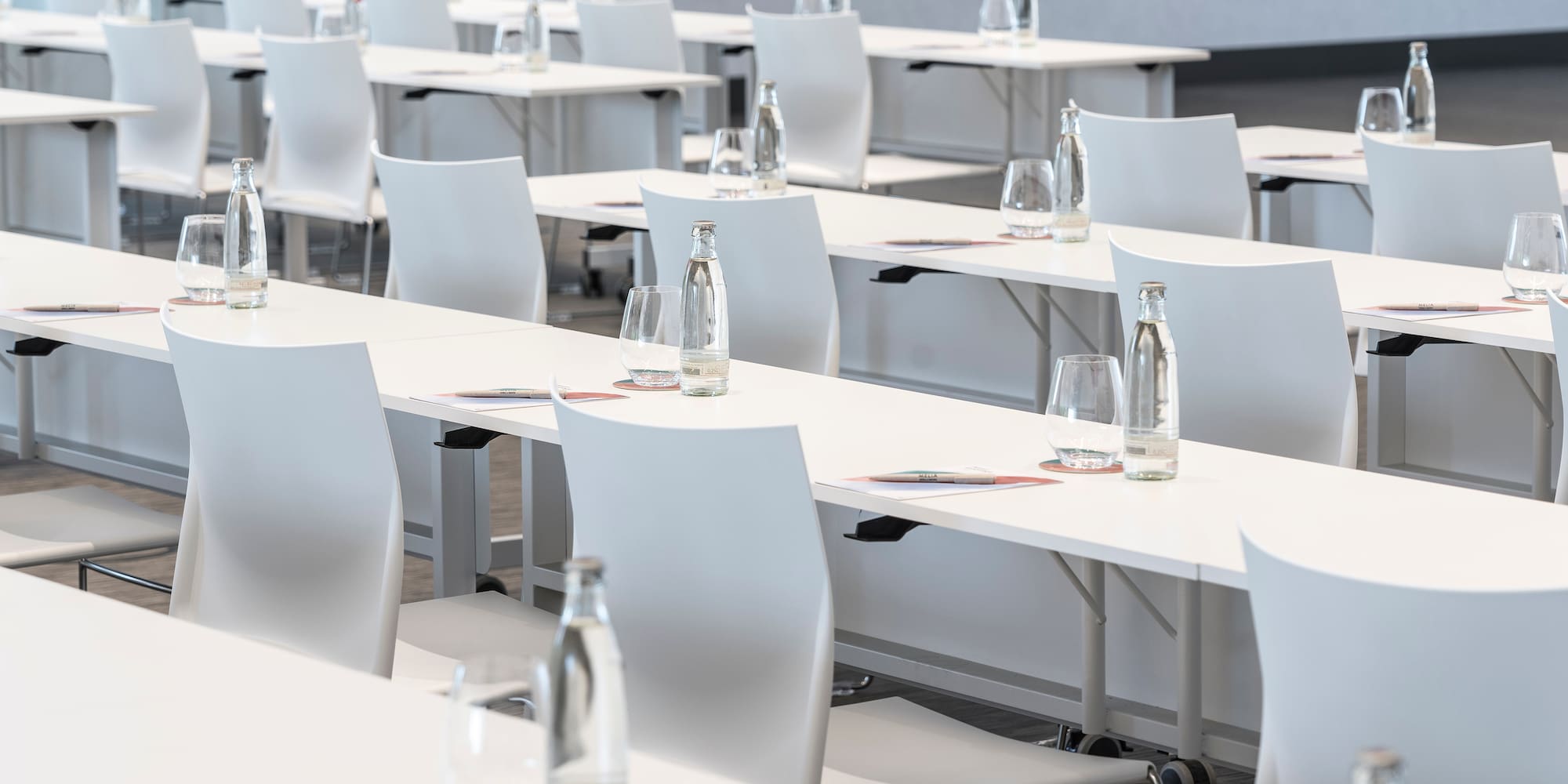 a room with tables and chairs