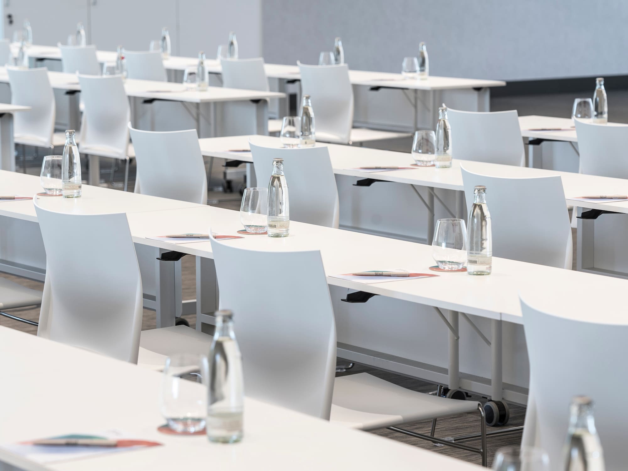 a room with tables and chairs