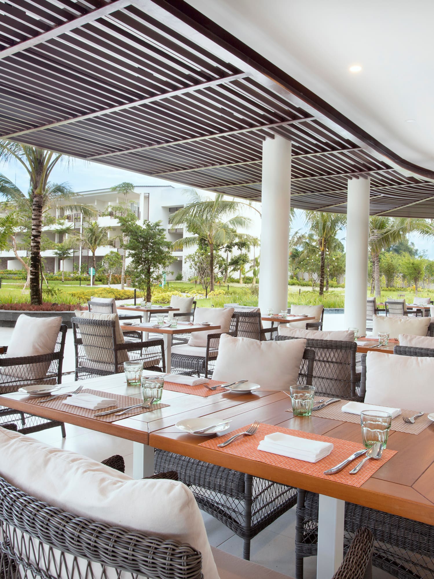 a restaurant with tables and chairs