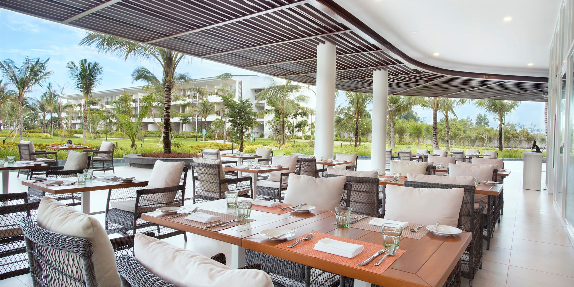 a restaurant with tables and chairs