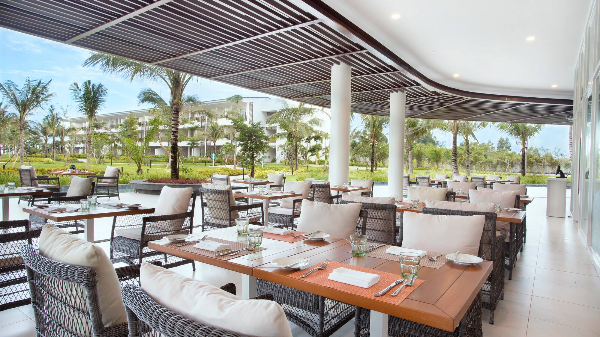 a restaurant with tables and chairs