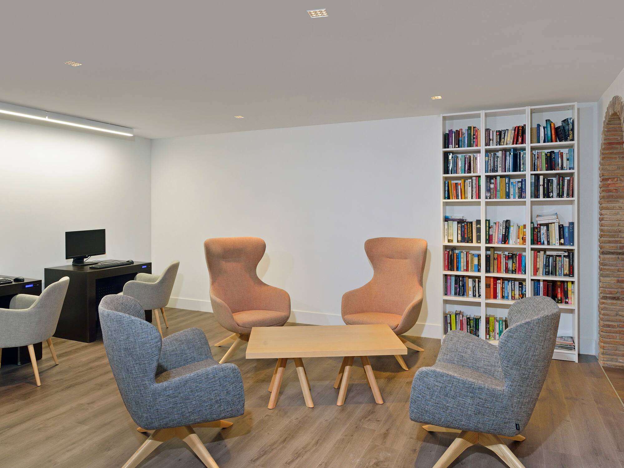 a room with a table and chairs