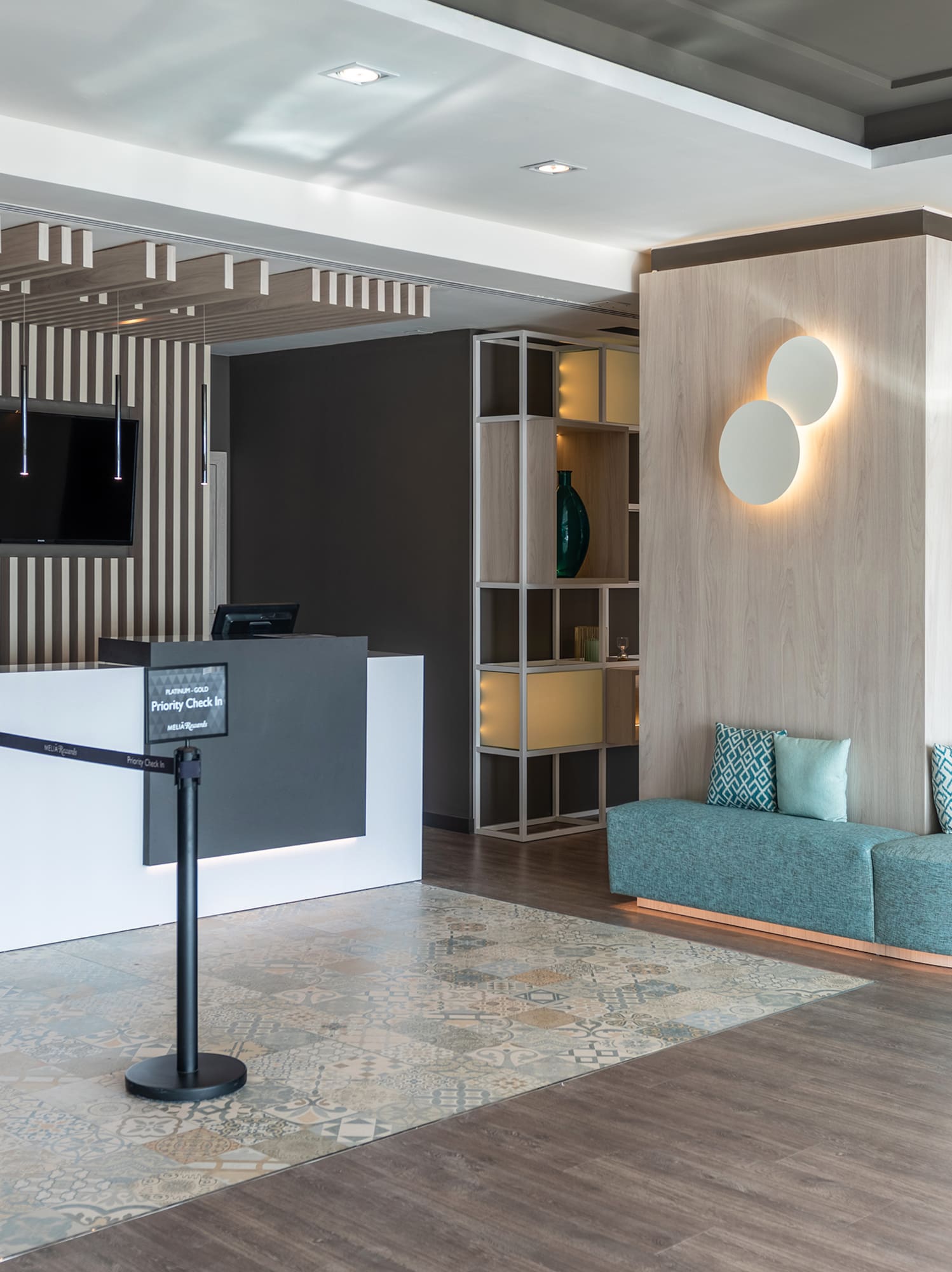 a reception area with a couch and a desk