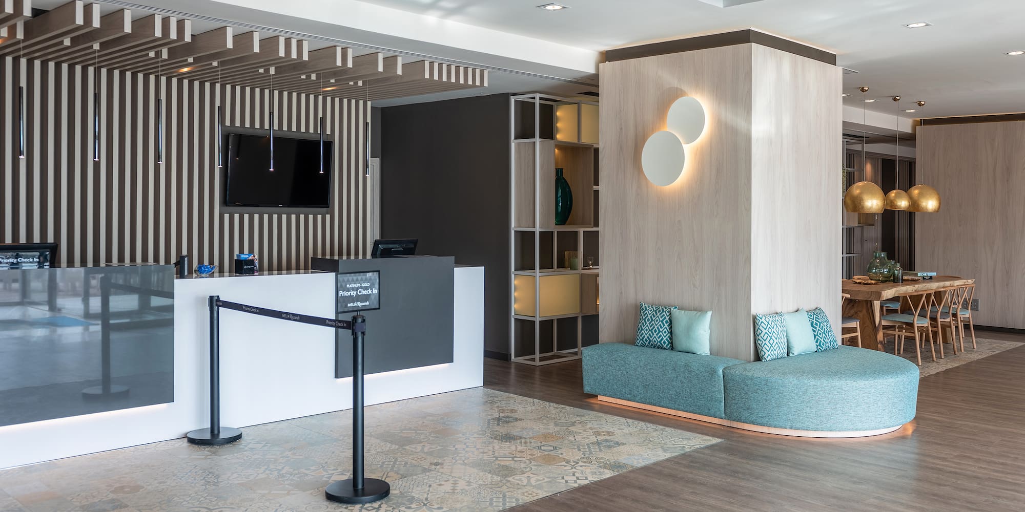 a reception area with a couch and a desk