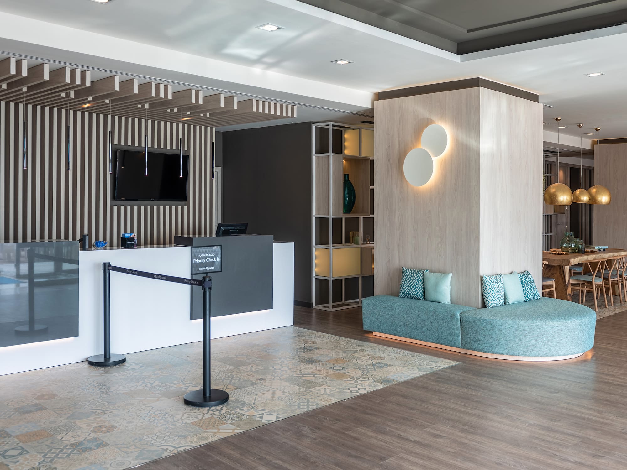 a reception area with a couch and a desk