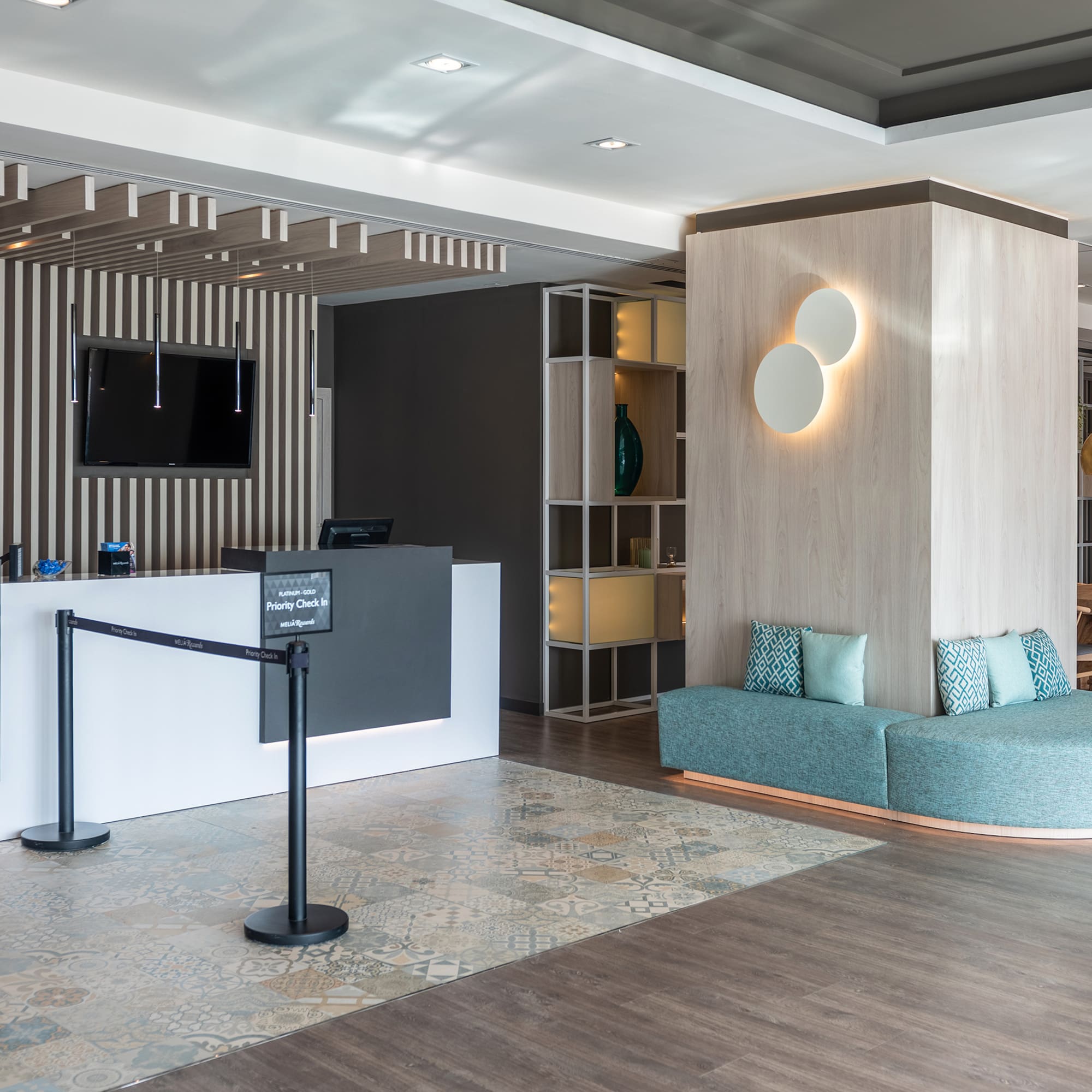 a reception area with a couch and a desk