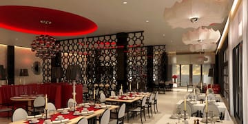 a restaurant with tables and chairs