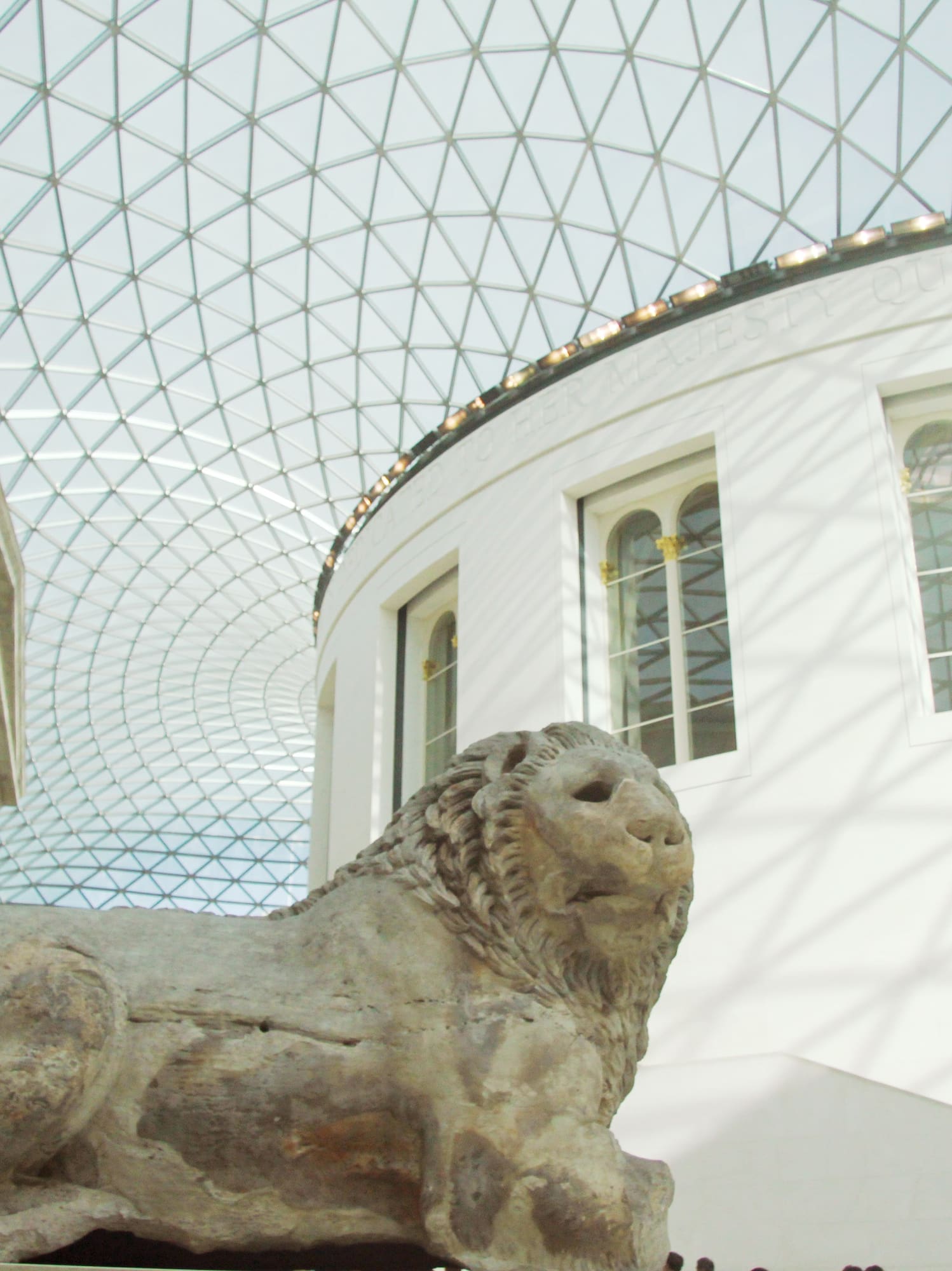 a statue of a lion in a building