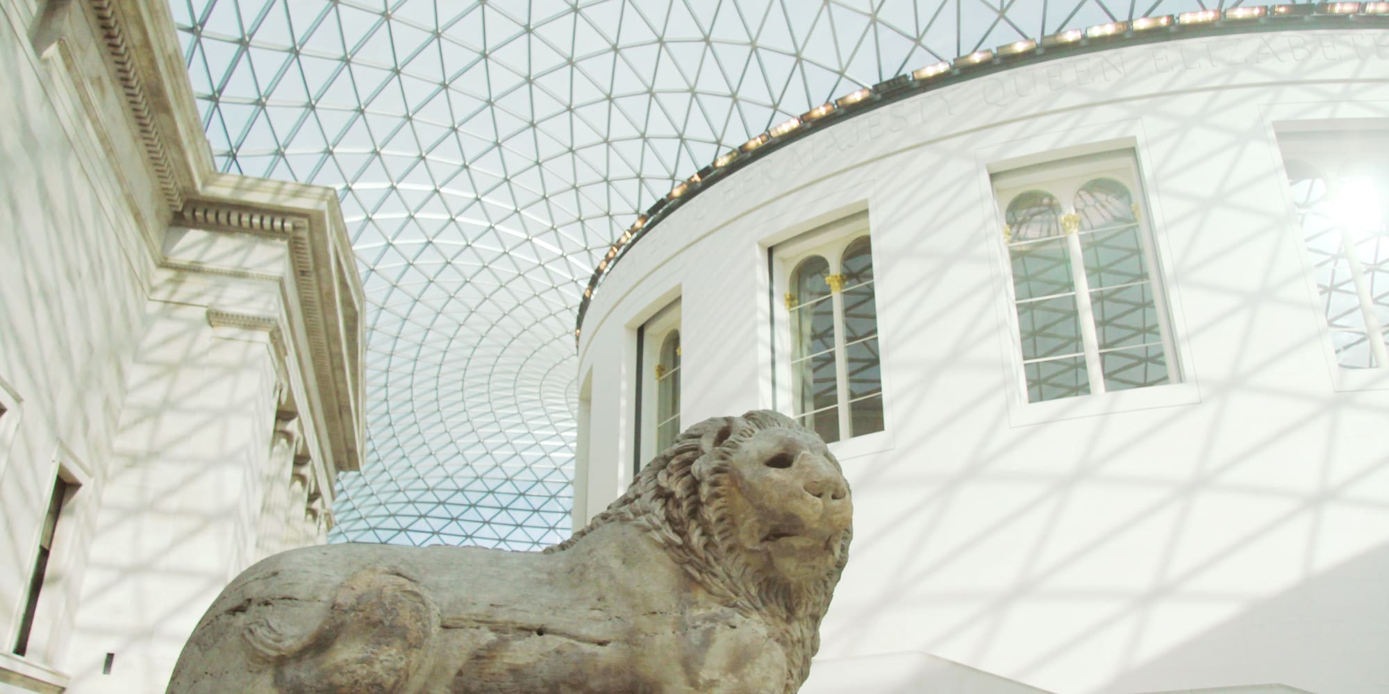 a statue of a lion in a building