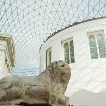 a statue of a lion in a building