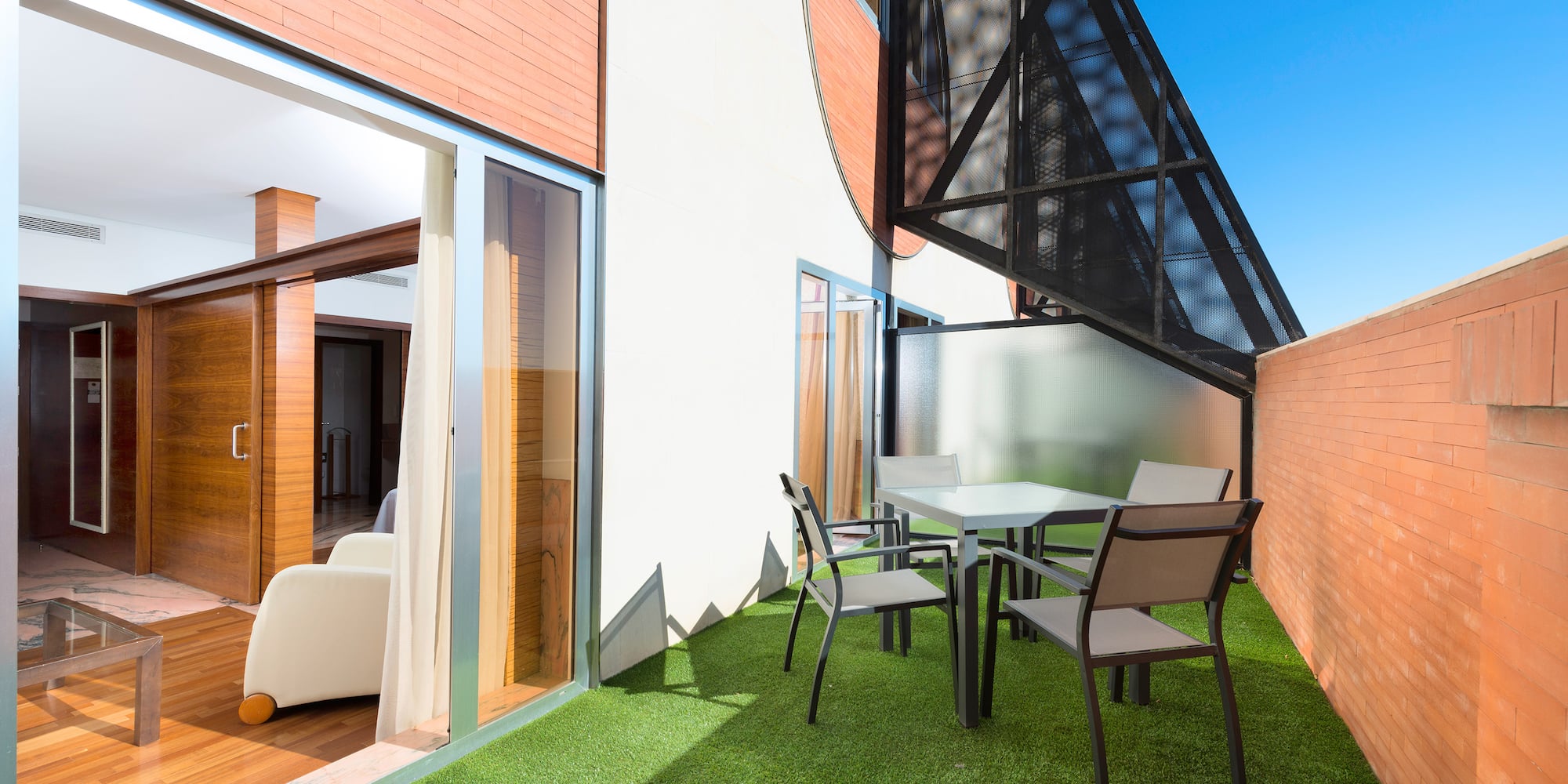 a table and chairs on a patio