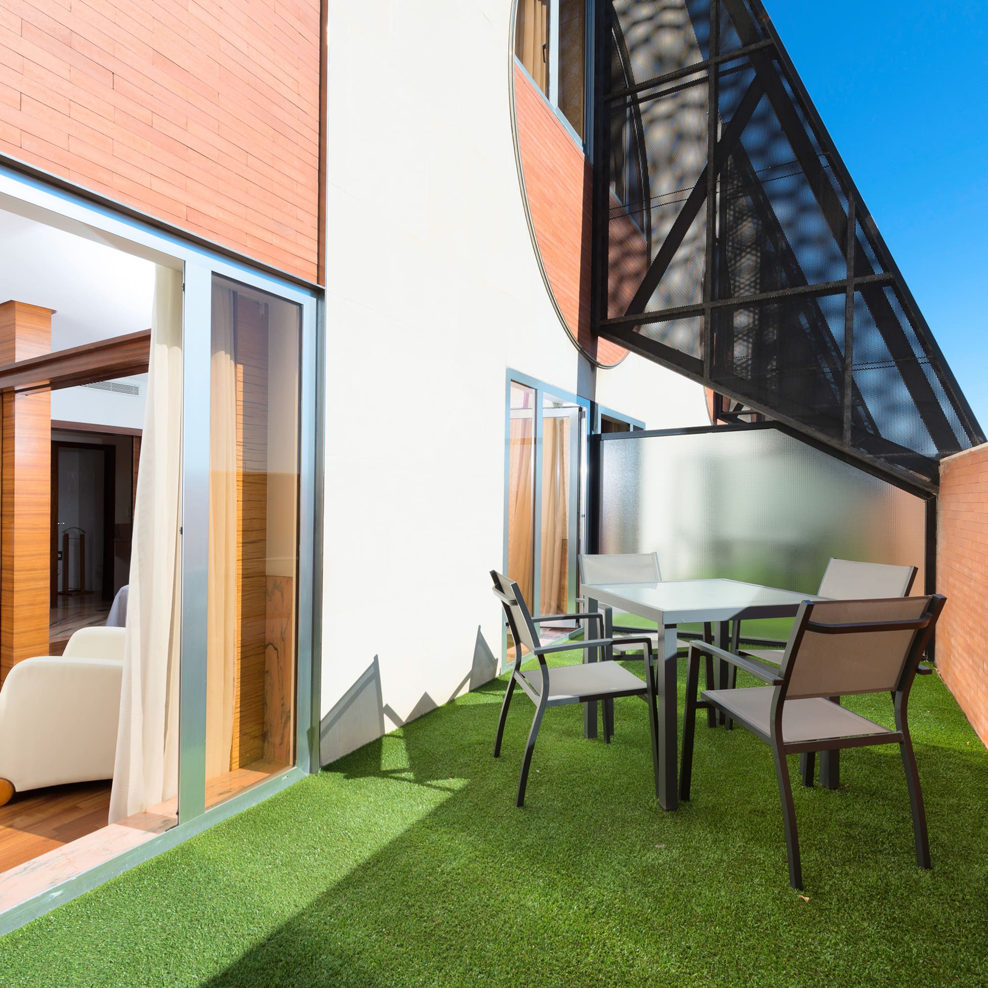 a table and chairs on a patio