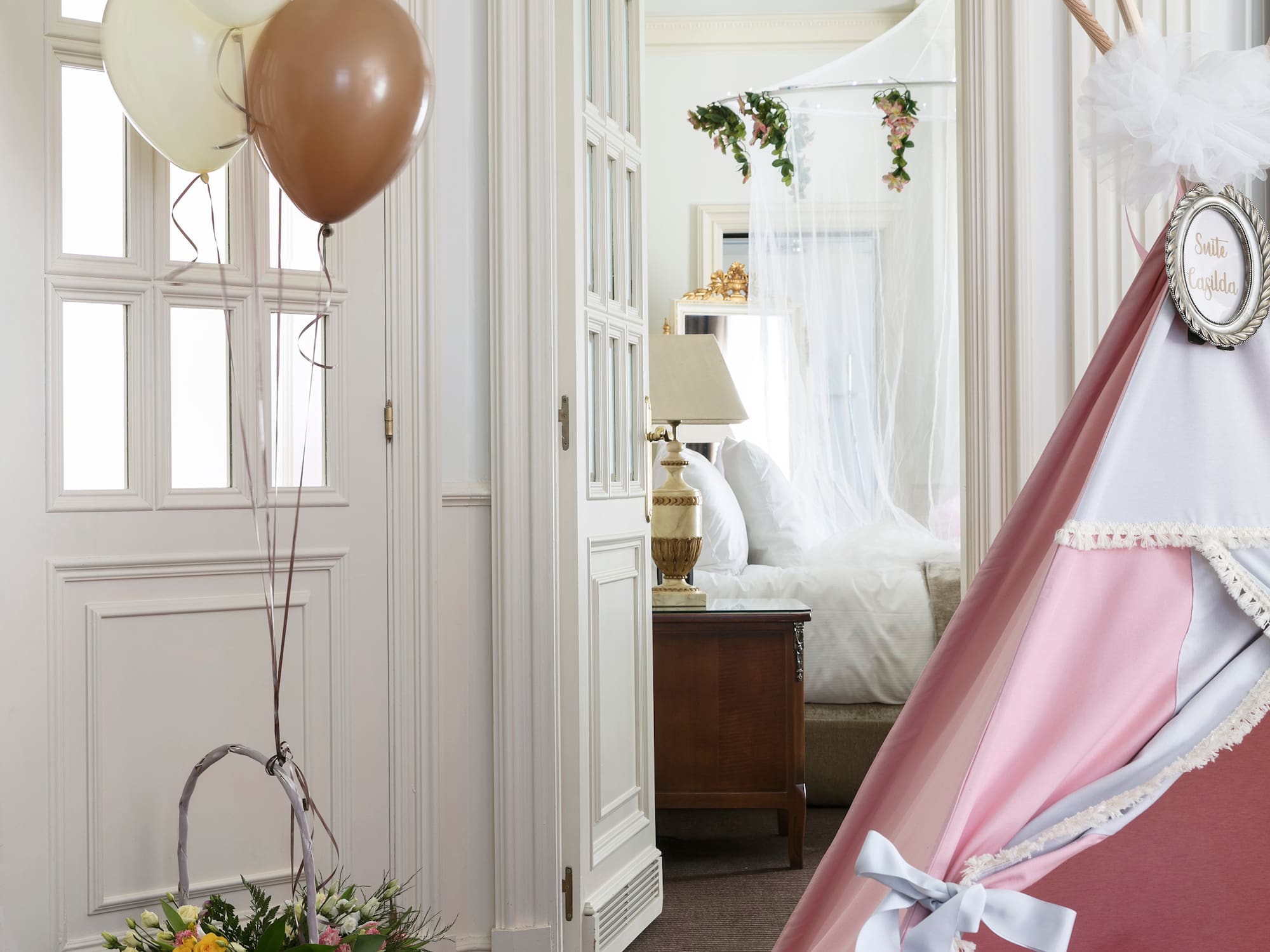 a street with cars and buildings in the background
