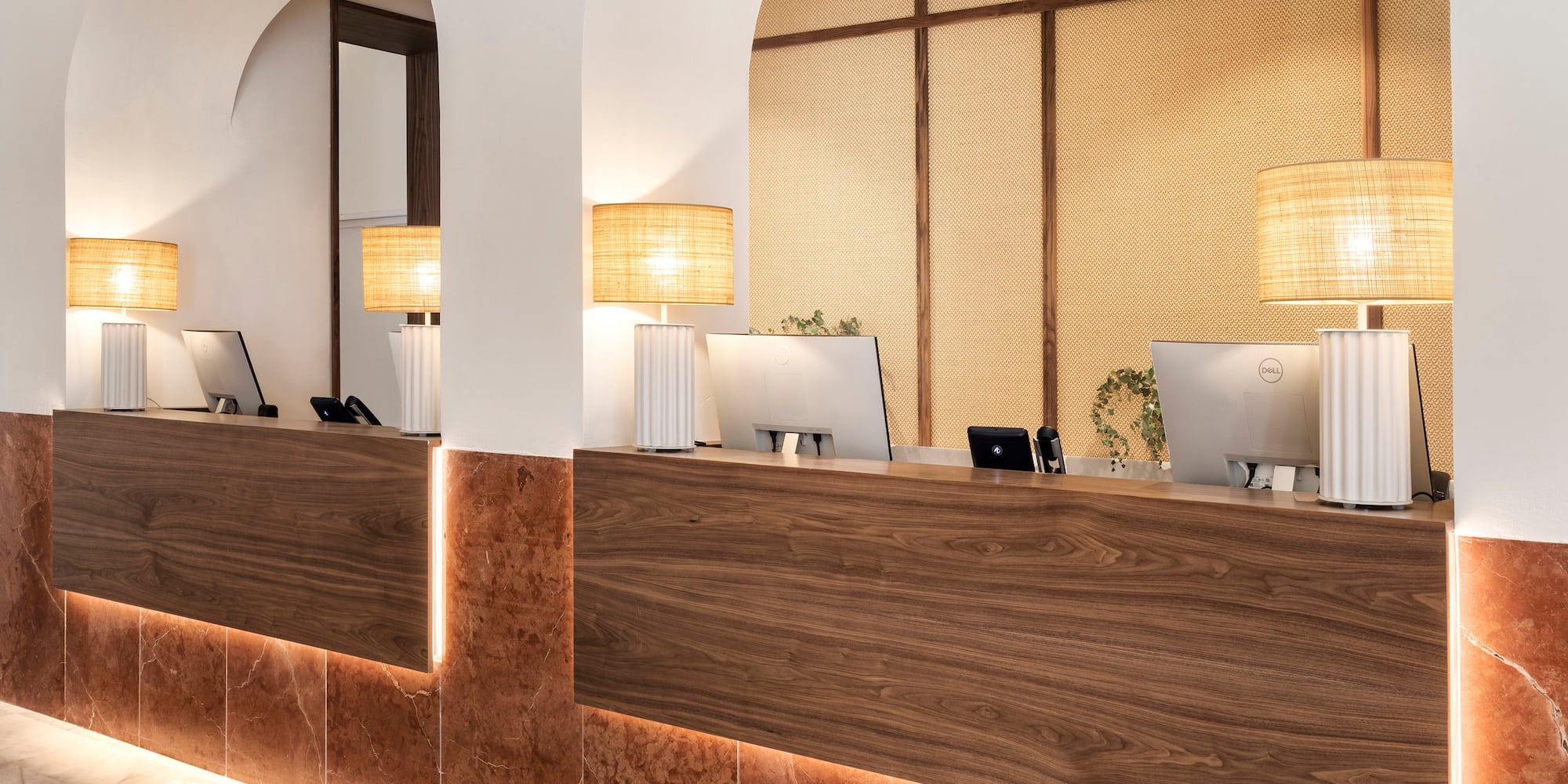 a reception desk in a hotel