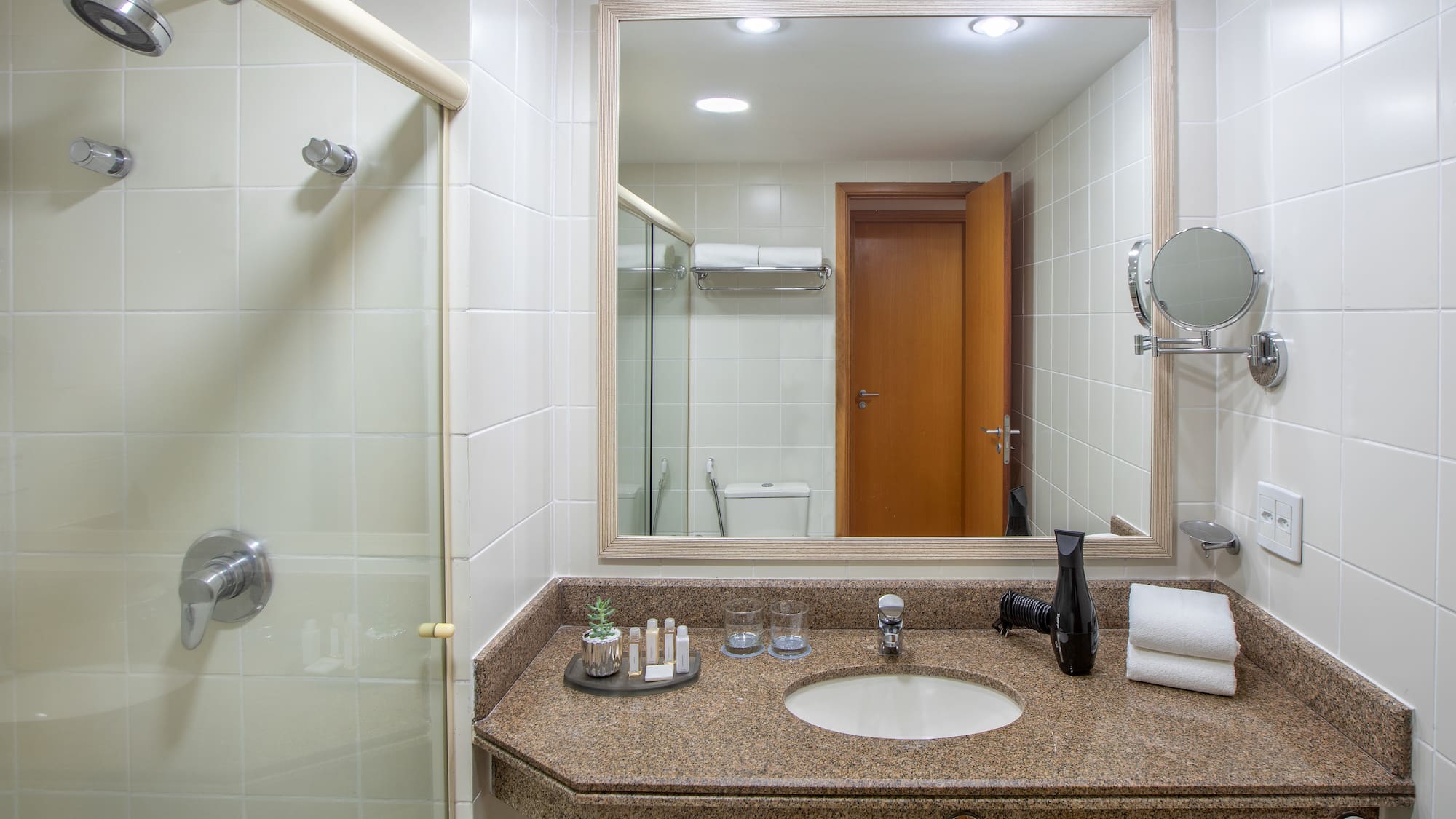 a bathroom with a mirror and sink
