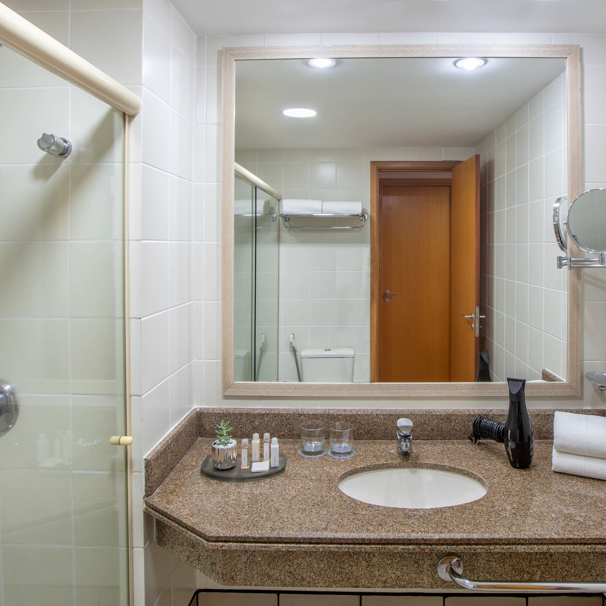 a bathroom with a mirror and sink