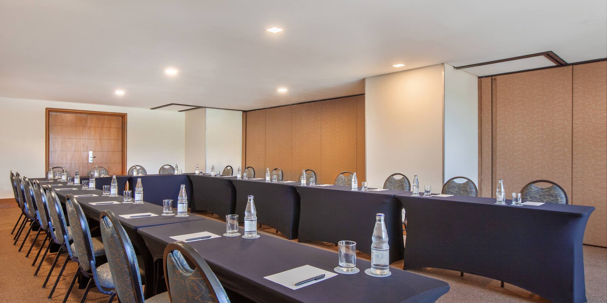 a room with tables and chairs