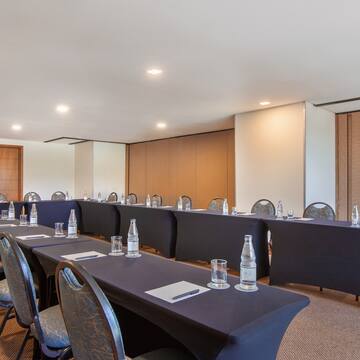 a room with tables and chairs
