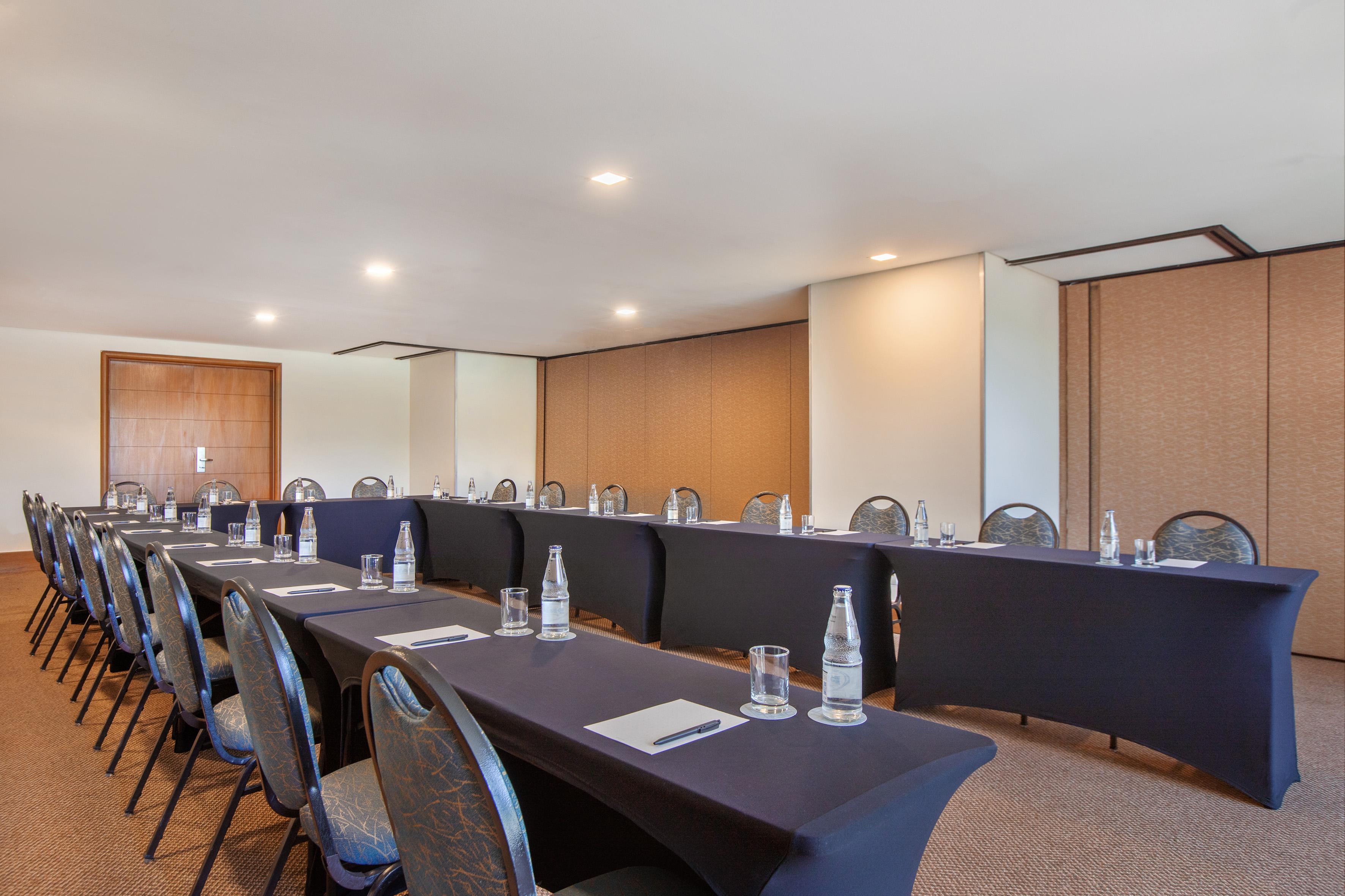 a room with tables and chairs