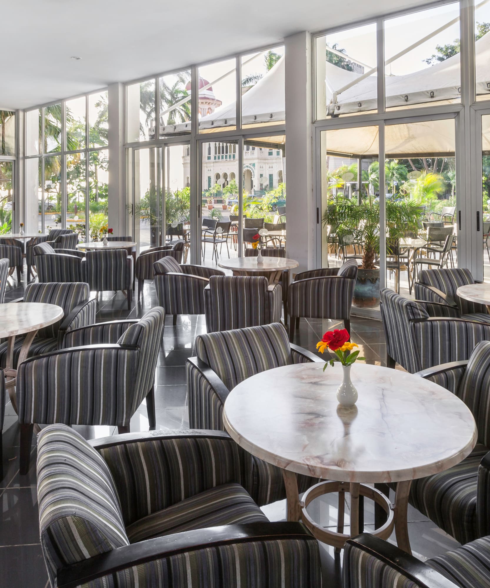 a room with tables and chairs