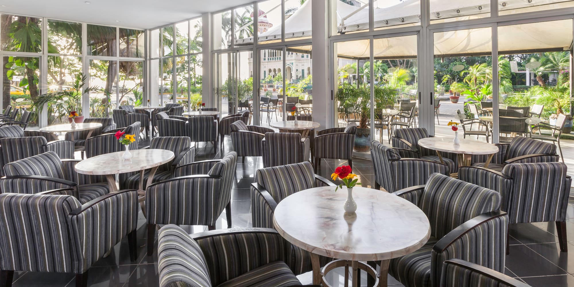 a room with tables and chairs