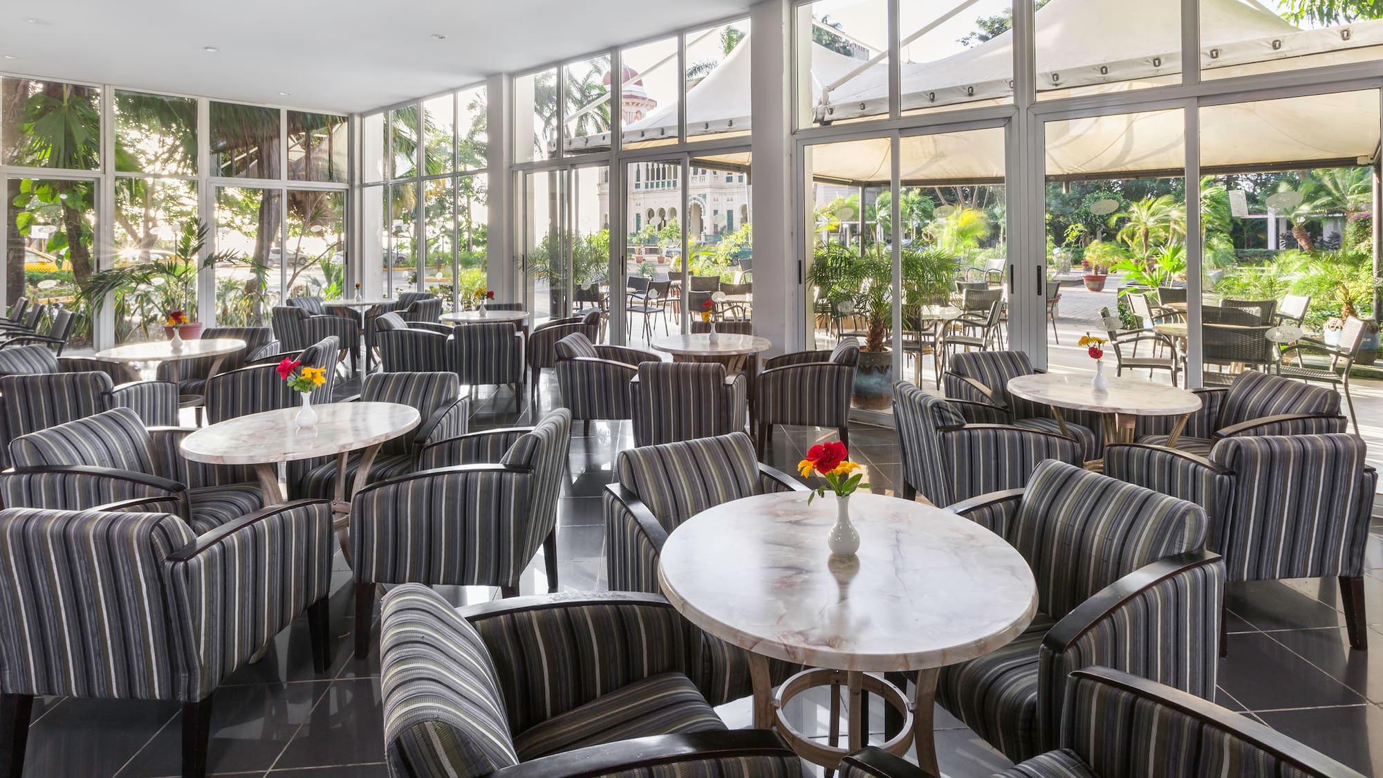 a room with tables and chairs