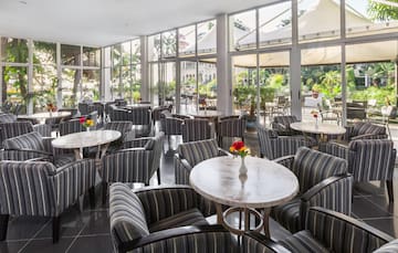 a room with tables and chairs