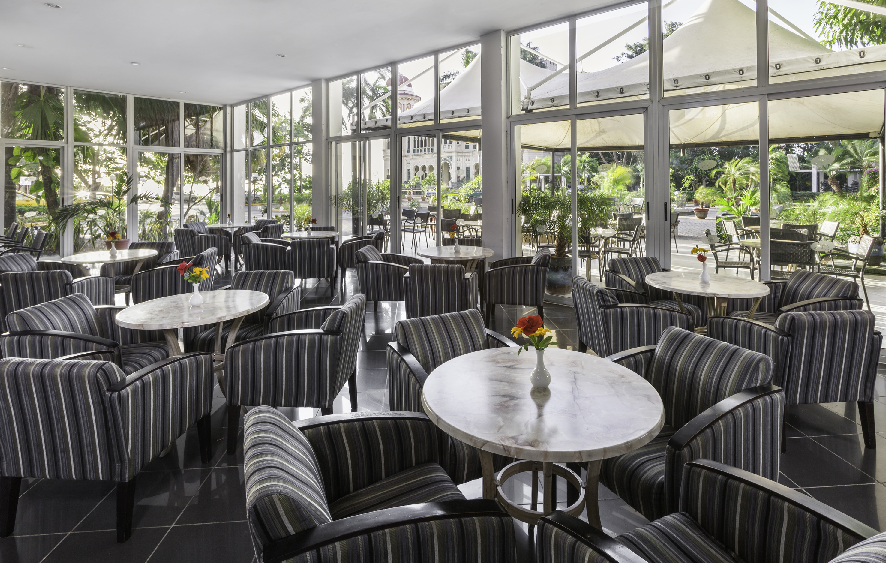 a room with tables and chairs