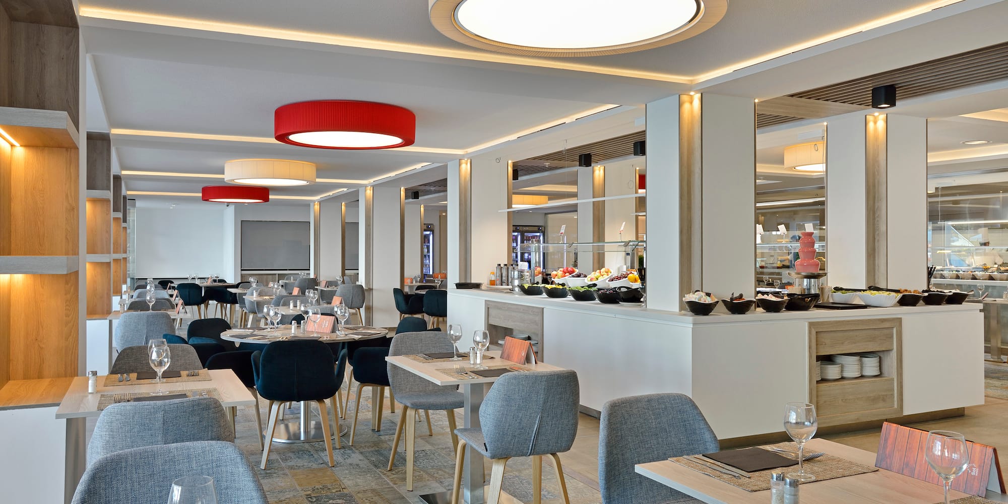 a restaurant with tables and chairs