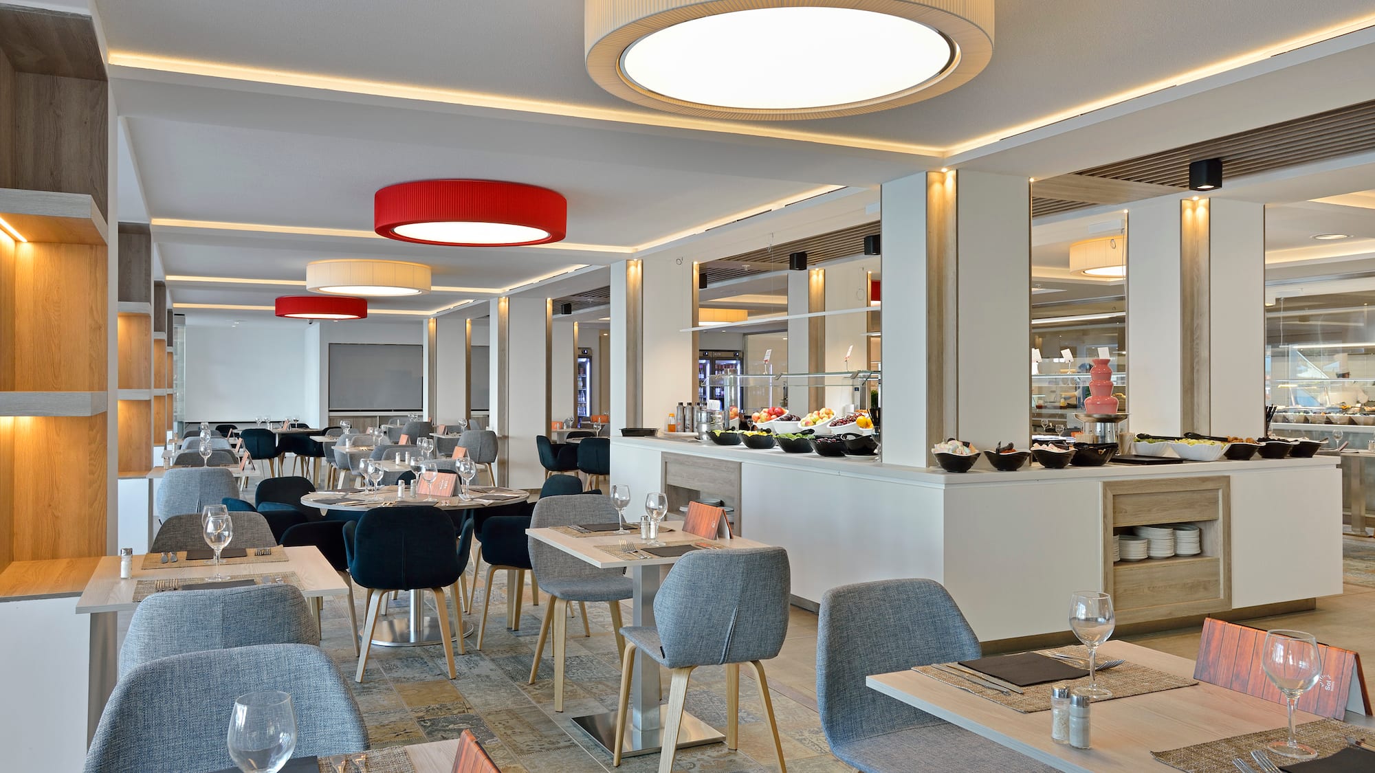 a restaurant with tables and chairs