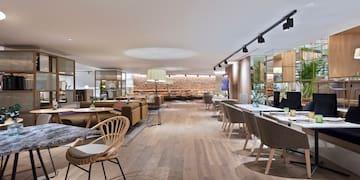 a room with tables and chairs