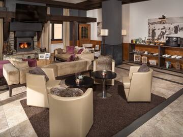 a room with a fireplace and furniture
